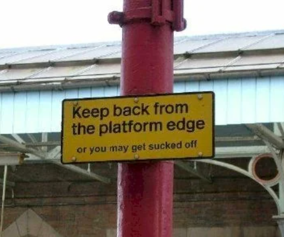 Train platform safety sign reading Keep Back From The Platform Edge with humorous added context