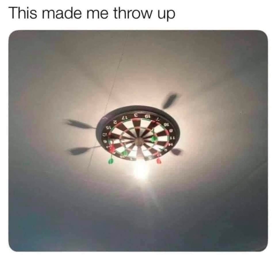 Chaotic Meh meme titled “This Made Me Throw Up – Dartboard on Ceiling Light.”
